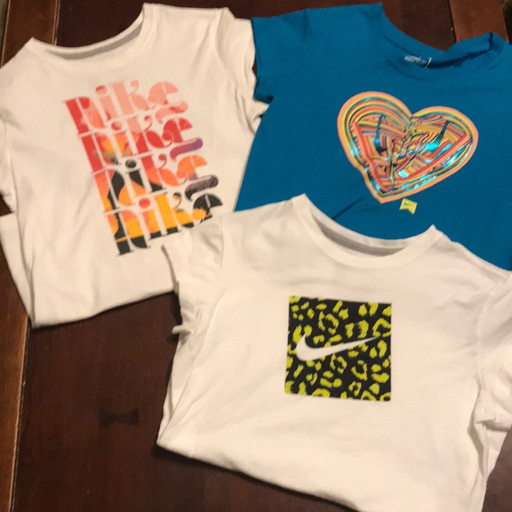 Lot of girl’s size large Nike tee shirts